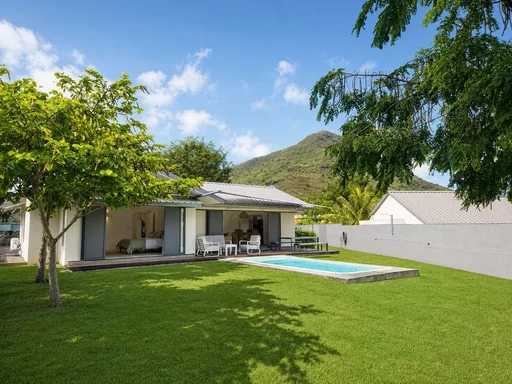 Duplex in a tropical garden